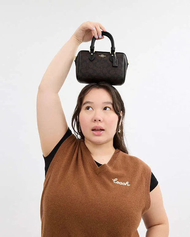 Coach Mini Rowan Crossbody Bag In Signature Canvas Signature Canvas-Gold-Walnut-Black