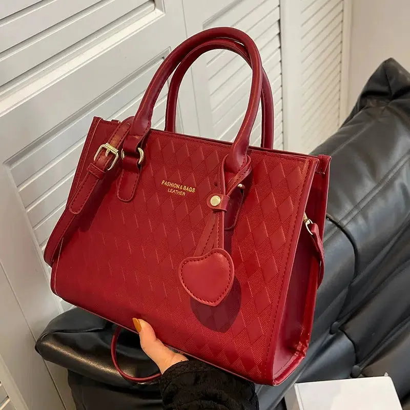 Heart Charm Quilted Leather Tote Bag