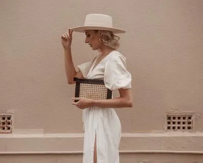 Heather Rattan and Leather Clutch