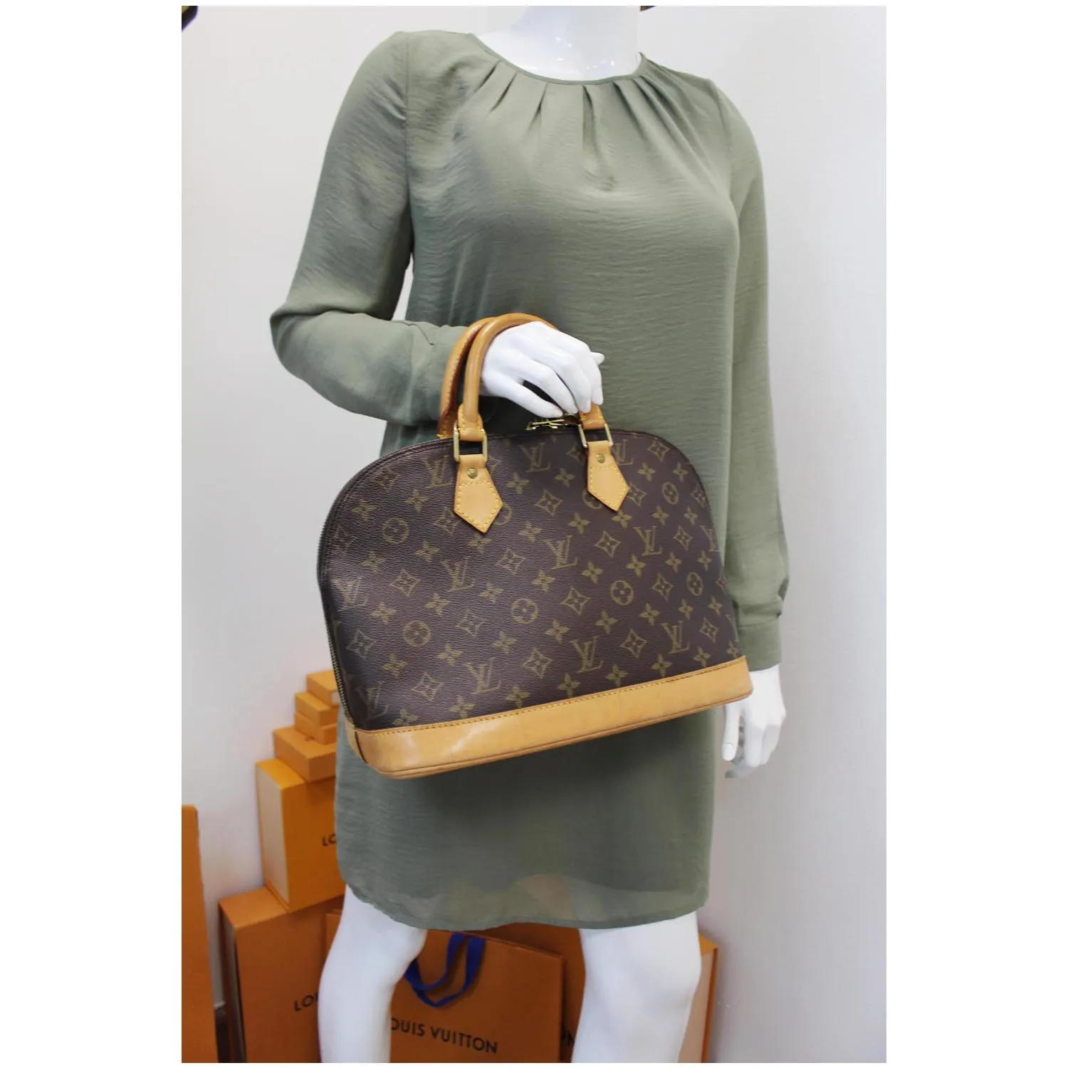 LOUIS VUITTON Alma Monogram Canvas Satchel Bag Brown