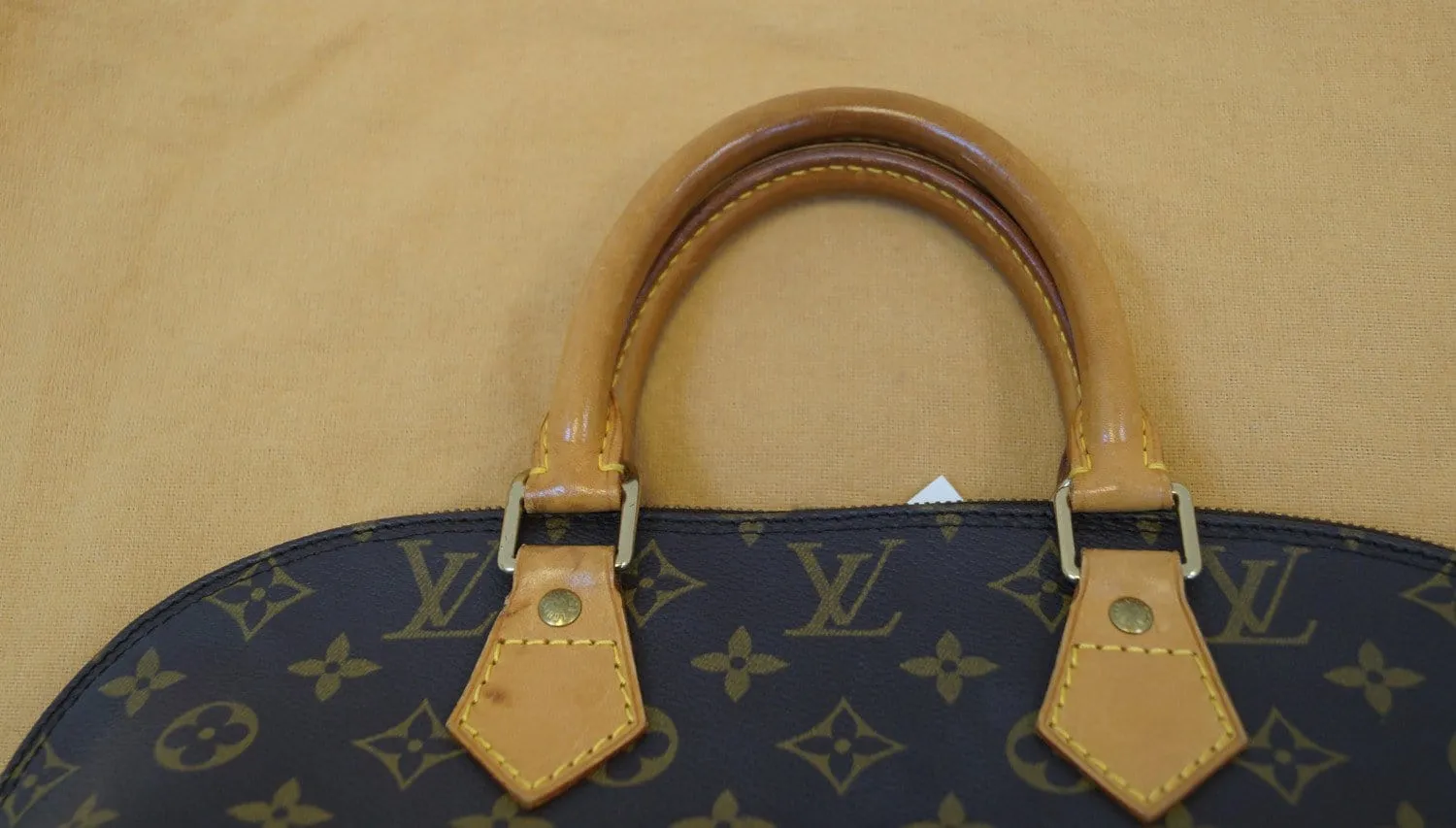 LOUIS VUITTON Monogram Canvas Alma Satchel