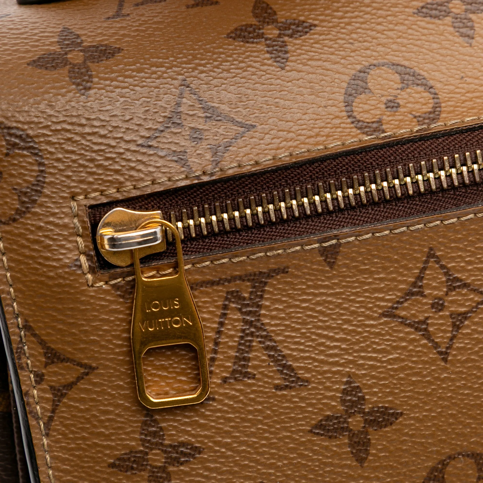 Monogram Reverse Pochette Metis